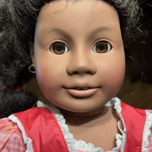 American Girl Doll with Red and Pink Outfit